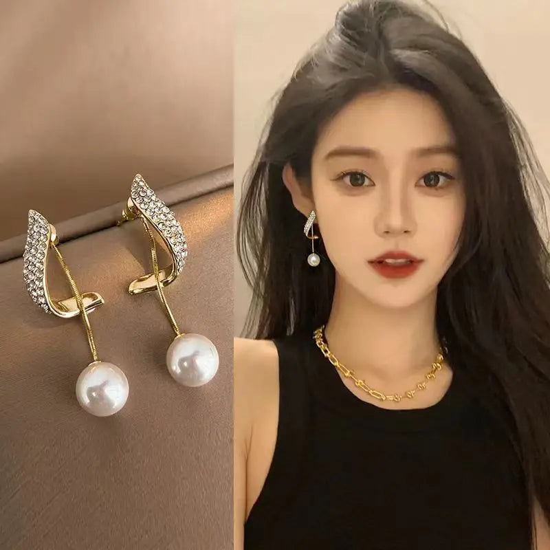 A new two wearing Pearl earrings