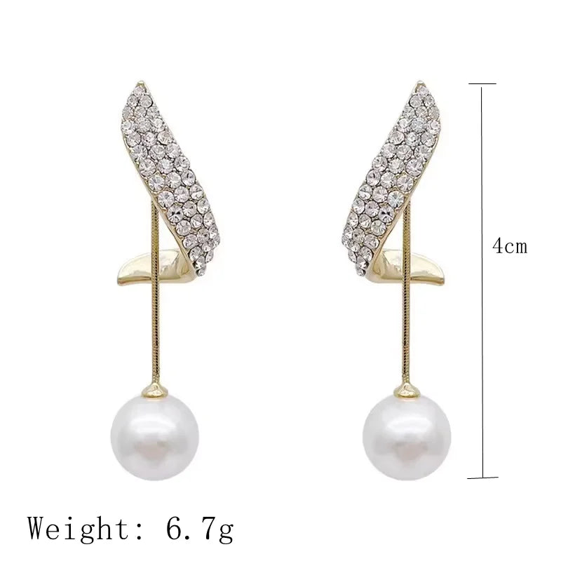 A new two wearing Pearl earrings